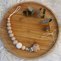 Attache sucette en bois Nude blanc cassé