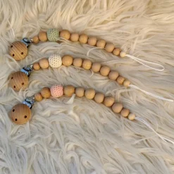 Attache sucette en bois Nude blanc cassé