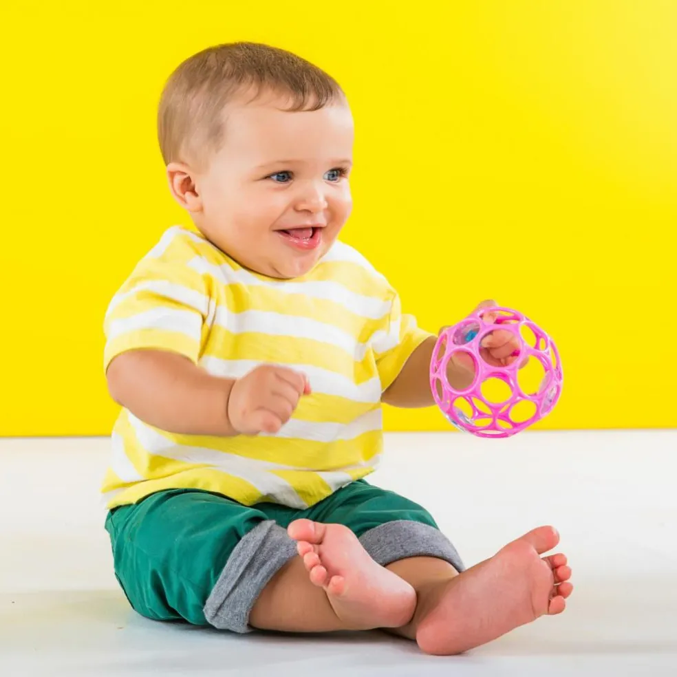 Balle hochet sensoriel rose