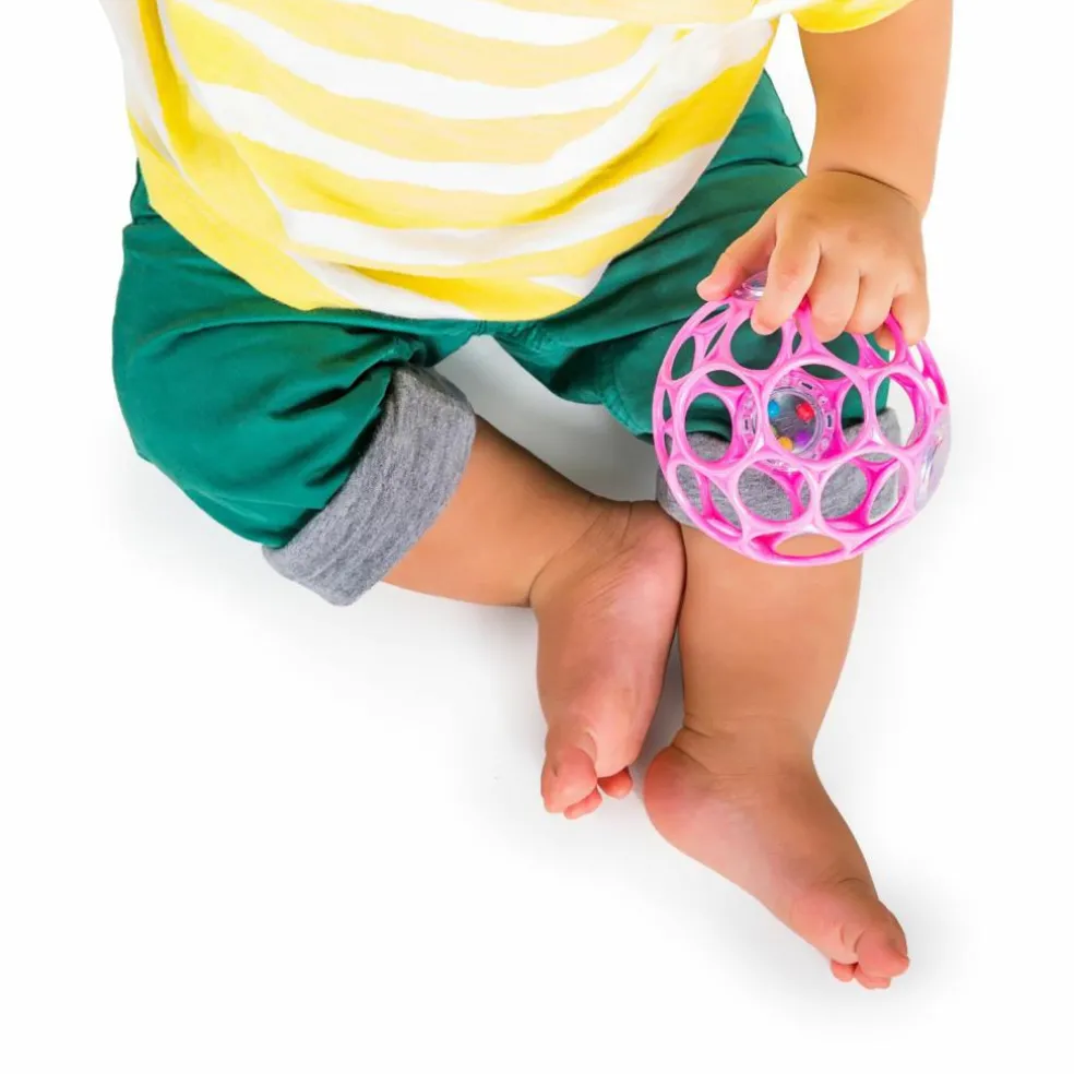 Balle hochet sensoriel rose