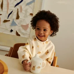 Bavoir à manches Merle Elephant Crème de la crème