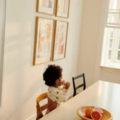 Bavoir à manches Merle Elephant Crème de la crème