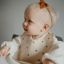 Bavoir à poche en silicone Black daisy