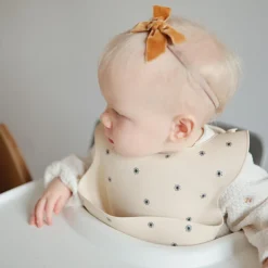 Bavoir à poche en silicone Black daisy