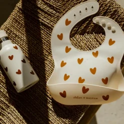 Bavoir en silicone Coeurs Crème