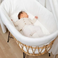 Berceau en rotin avec pieds en métal - Reconditionné