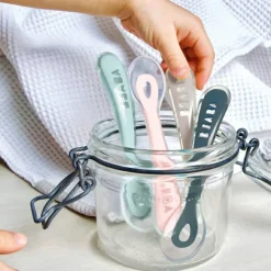 Lot de 4 cuillères en silicone 2e âge bleu, rose et vert d'eau