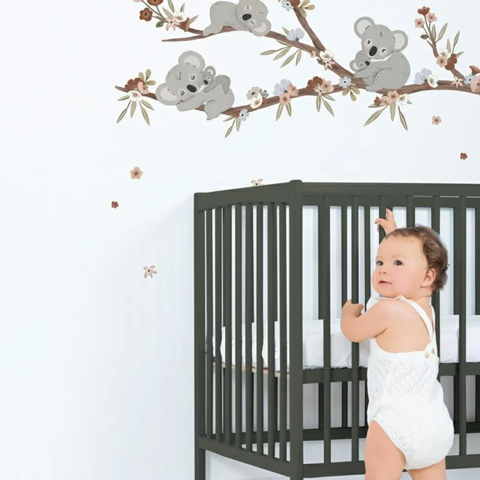 Sticker mural Koalas sur branche avec fleurs (118 x 54 cm)