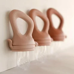 Sucette grignoteuse terre de sienne avec 4 embouts